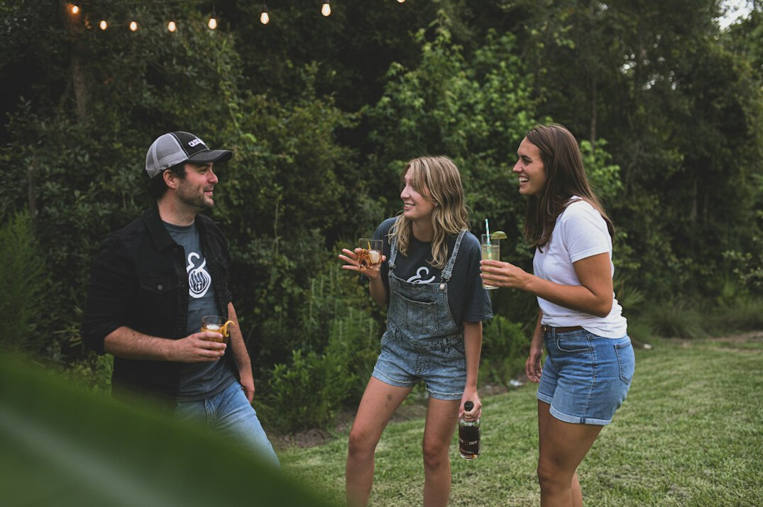 Group of friends talking and laughing together
