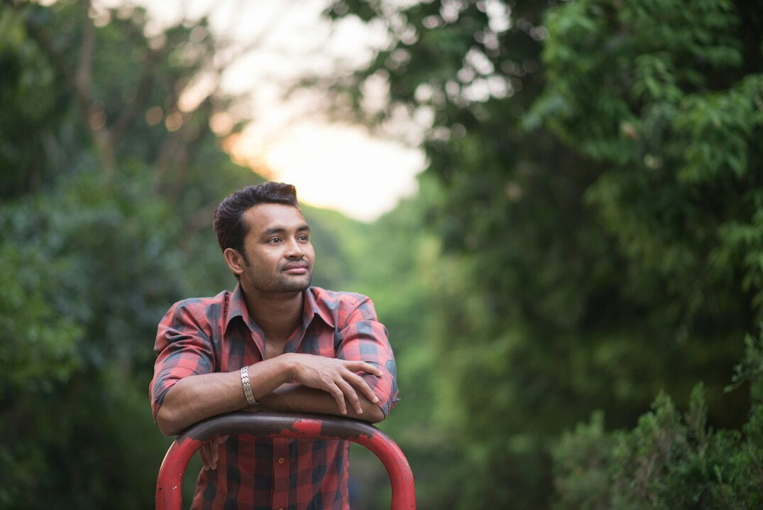 Portrait of a man smiling outdoors
